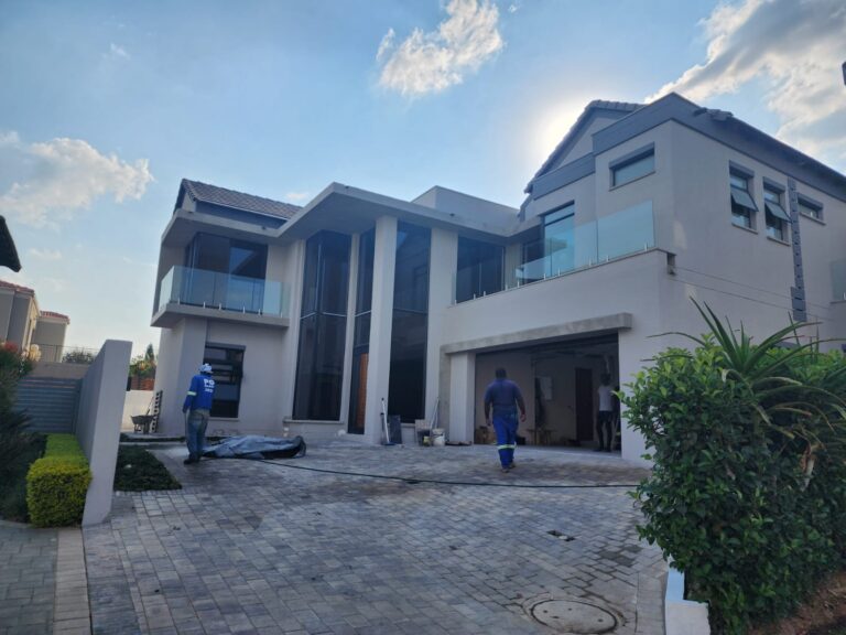 Concrete slabs, street view, contemporary house